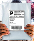 Front view of 14.5 X 19 Inch Poly Mailers Bulk Pack for Clothing and More, heavy duty waterproof tear-resistant shipping envelope held in hands.