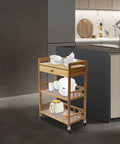 Heavy Duty Rolling Kitchen Cart With Drawer, Three Tier Bamboo Utility Island For Microwave And Coffee Station with dishes and appliances.