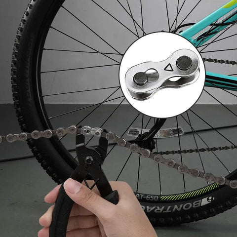 Heavy Duty Reusable Bicycle Chain Links Compatible With 6 7 8 Speed Mountain And Road Cycles Solid Steel Quick Connectors in use with pliers.