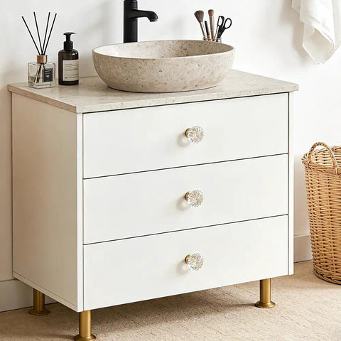 White dresser with 8 Pack Gold Crystal Cabinet Knobs With Screws, Glass Flower Dresser Pulls, in modern bathroom setting.