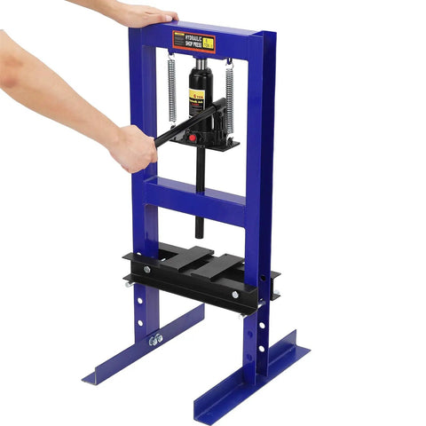 Person operating 6 Ton H Frame Shop Hydraulic Press With Two Press Plates Heavy Duty Garage Ready Auto Repair Machine Adjustable Pressure Overload