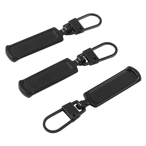 Three black zinc alloy zipper pulls from the Six Pack Zipper Pull Replacement Kit Universal Zipper Tags Cord Pulls For Purses Jackets Backpacks Boots Coats Suitcases Jeans Dresses Zipper Slider Handle Mend Kit Black.