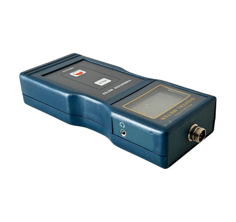 Digital Vibration Meter And Vibration Analyzer For Machinery A Handy Pro Grade Tool For Detecting Imbalance Misalignment And Other Mechanical Faults In Rotating Equipment ISO 2954 Compliant compact blue handheld unit, angled side view