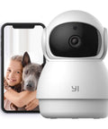 Pan Tilt 360 Degree Indoor Security Camera With Night Vision 1080p Pet Cam For Dogs And Cats 2 Way Audio Motion Detection Phone App Control Works With Alexa And Google Assistant next to a smartphone displaying a child and dog.