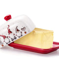 Festive Christmas Butter Dish With Tight Sealing Lid, Solid Ceramic Gnome Keeper For Kitchen Countertops displaying butter.