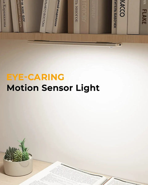Under Cabinet Lights With Motion Sensor, Battery Operated Rechargeable Wireless Closet Light Bundle Of 3, 13.8 Inch illuminating a desk