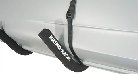 Heavy Duty Wall Hanger With 176 Pound Capacity For Roof Boxes Kayaks SUPs Canoes And More Keep Your Home Or Garage Clutter Free And Ready To Grab Gear Fast with straps attached to a gray surface.