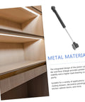 NUOBESTY cabinet lift support hinge with soft-close for chamber doors; metal piston and mounting plate, installed in a wooden cabinet.