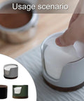 Slick Swivel Coffee Filter Paper Holder and Brewing Tool Caddy with dark green wood base, storing and dispensing round papers.