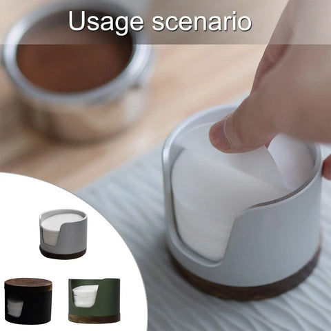 Slick Swivel Coffee Filter Paper Holder and Brewing Tool Caddy with dark green wood base, storing and dispensing round papers.