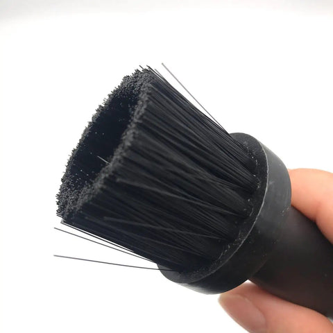 Close-up of black bristle tip of Wheel Lug Nut Cleaning Brush Set For Car Detailing Kit Chrome Closed End Bulge Acorn Lug Nut Covers