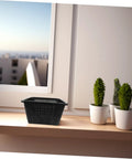 Hydroponic Net Pots And Mesh Grow Bags For Indoor Aquatic Plants, black perforated plant basket on a windowsill