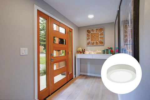 Slick 4 Inch Led Ceiling Light Low Profile Surface Mount Downlight Wet Rated Matte White Trim in modern entryway.