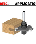 9/16 Inch Depth Slotting Cutter Set With Arbor And Bearing cutting groove in wood block, for handheld or table mounted routers, side view.