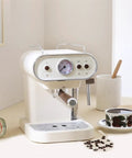 Retro Style Electric Coffee Maker Semi Automatic Espresso Machine With Steam Milk Frother And Glass Carafe Light Green American Plug Badass Morning Brew Solid Vibe For Kitchen Daily Grind on a counter with coffee cup and beans