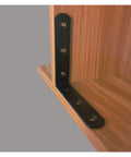 Slick Black Metal Corner Brackets For Shelves And Cabinets L Shaped wall support installed on wooden shelf for added stability.