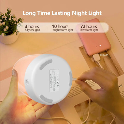 Hands holding Nursery Night Light For Kids With Dimmable Warm White Glow And 5 Color Changing Modes, USB rechargeable, soothing sleep aid.