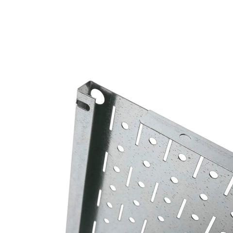 Close-up of modular pegboard wall organizer tile edge, showing steel construction with round and slotted peg holes.