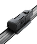 Close-up of AeroTwin OE Replacement Wiper Blades Set Of 2 For 26 Inch And 20 Inch Rain Ready Streak Free All Weather Performance With Graphite Coated Dual Rubber Easy Install With Pre Assembled OE Style Adapters showing graphite-coated rubber and adapter.