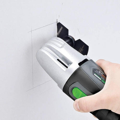 Person using Powerfully Versatile Oscillating Tool Kit With 19 Piece Accessory Set 21000 Oscillations Per Minute 4 Pin Attachment