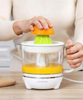 BXFirs Electric Masticating Juicer For Citrus Fruits Lemon Orange Grapefruit Press With Easy Clean Spout 45W Squeezer Machine in use.