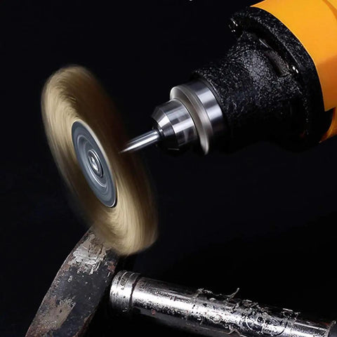 36 Piece Brass And Steel Wire Brush Polishing Wheel Kit for Rotary Tools in action on metal surface