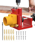 Top Shelf Aluminum Drilling Guide Jig For Cabinet Assembly And Woodworking With Zero Hassle Depth Controls, red jig set with drill bits and screws.