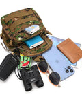 Waterproof Tactical Crossbody Backpack with MOLLE System Outdoor EDC Sling Chest Bag open with accessories spilling out