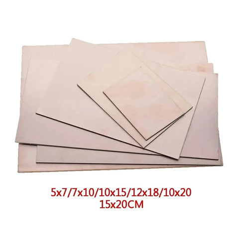 Stack of FR-4 Fiberglass Single Sided Copper Clad DIY PCB Prototyping Boards in various sizes for electronics projects.
