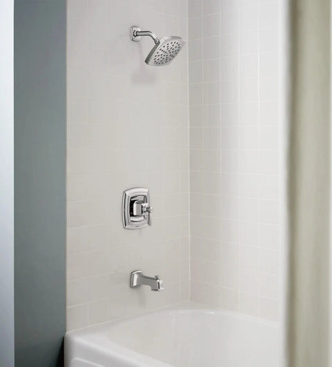 Conway Chrome Posi-Temp Shower Trim Set with square showerhead, lever handle, and tub spout in satin chrome finish installed in bathroom