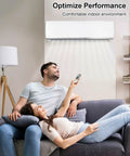 Couple relaxing on couch with remote controlling wall-mounted air conditioner