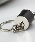 Killer 3D Manual Shifter Keychain With Moving Gear Lever And Hella Realistic Chrome Alloy Auto Part Key Ring Featuring Sweet Ride Design Plus Lit Gift For Gearheads And Car Enthusiasts in chrome and black with keyring.
