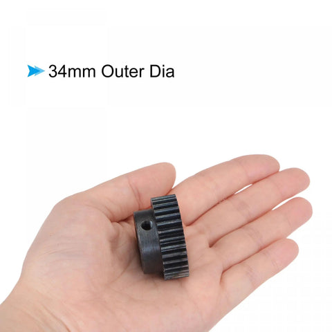 Mod 1 Pinion Gear 32 Teeth 6mm Bore Hardened Steel for RC Cars Trucks and Buggy held in hand showing 34mm outer diameter