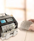 USD High Speed Money Counter With Value Counting, Add And Batch Mode, UV MG IR Counterfeit Detection, RBC ES250N in use
