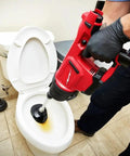 Cordless Drain Cleaning Air Gun Kit With Variable Pressure Control And Quick Swap Auger Tips For Sinks Toilets And Drains quickly unblocks clogs in a toilet.