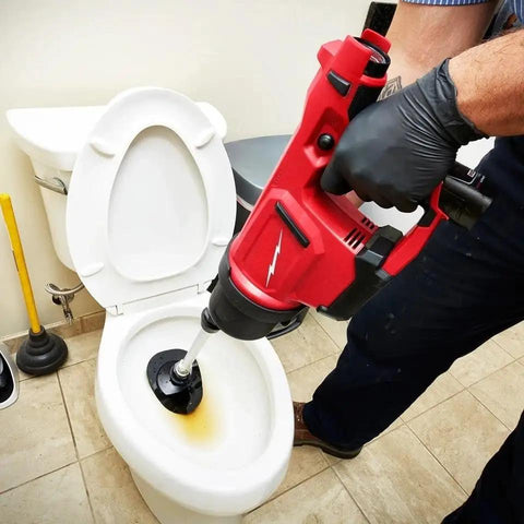 Cordless Drain Cleaning Air Gun Kit With Variable Pressure Control And Quick Swap Auger Tips For Sinks Toilets And Drains quickly unblocks clogs in a toilet.