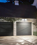 Ultra Bright Outdoor Security Flood Light With Motion Sensor 1500 Lumens illuminating garage doors IP65 waterproof 6000K daylight