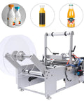 Semi Automatic Round Bottle Labeler For 20 To 120 Mm Diameter High Speed Packaging Applicator with roll for labels.
