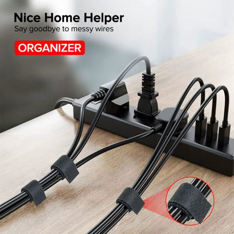 Self Adhesive Cable Management Hoop With Sticky Wire Organizer Keeps Your Desk Slick And Tidy Game Changer Tear Off Nylon Cord Wrap Kit For Home Office In Black with organized wires on a power strip.