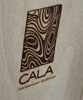 CALA Contemporary Woodwork logo on Live Edge Black Walnut Barn Door Handcrafted In Minnesota Made To Order One Of A Kind Custom Wood Sliding Door.