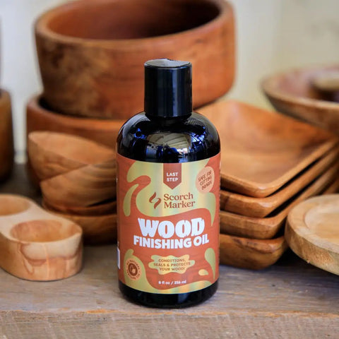 Straight Up Coconut Mct Wood Finishing Oil And Food Safe Cutting Board Sealer Restores Grain Naturally Every Time Rub In Wipe Off With Zero Hassle Care For Natural Wooden Surfaces Real Deal Quality In An 8 Oz Bottle You Need placed next to wooden bowls.