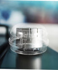 Close-up of Six Pack Stove Knob Covers Transparent Safety Guards For Gas Electric And Induction Stoves And Washing Machines Easy To Install Button Protectors For Kid Safe Home No Fuss Family on a stove.