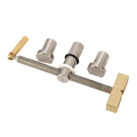 Heavy Duty Woodworking Bench Dog Clamp For Rock Solid Workholding Metal Desktop Clip with copper handle and grooved rod.