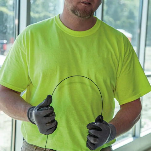 Technician using No Nonsense Heavy Duty Steel Fish Tape Wire Pulling Kit With 50 Foot Tape 500 Foot Pull Line And All Purpose Lubricant