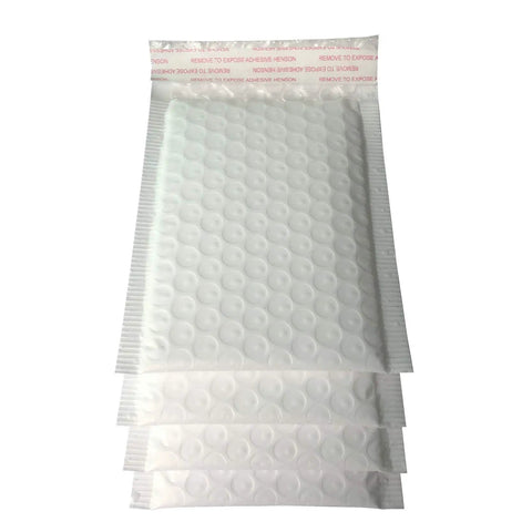 Stack of 3.5 by 5 inch white poly bubble mailers with self-sealing flap showing bubble interior, pack of 50 for cushioned protection