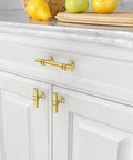 10 Pack 3 Inch 76mm Brushed Gold Cabinet Handles Set For Kitchen Cabinets Cupboards And Drawers Durable Metal Hardware With Classic Round Pull Design For Modern Furniture installed on white kitchen cabinets.