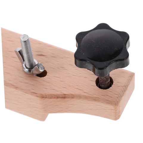 Close-up of wood and metal Guitar Bridge Clamp Repair Tool Set for Acoustic Guitars Pro Luthier Wrench Kit component.