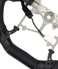 Close-up of Toyota Tacoma 2016 2023 Heated Perforated Leather Steering Wheel Replacement Kit, Premium Microfiber Leather