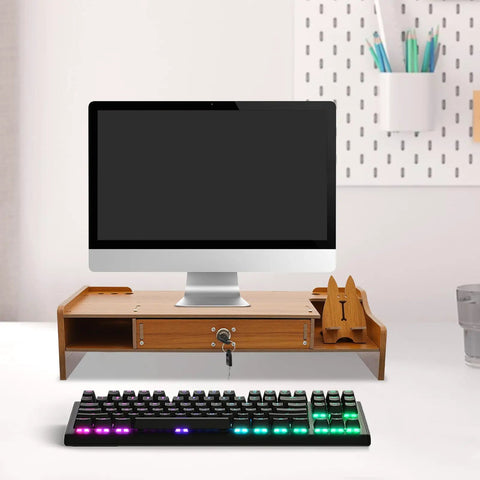 Transform Your Workspace With These Solid Wood Monitor Risers Featuring A Lockable Storage Drawer With Secure Laptop Stand Built Like Iron To Keep Your Desk Slick And Super Organized Daily with a wooden riser and keyboard.