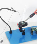 Helping Hands Soldering Station Kit With Vise Clamp Third Hand Adjustable PCB Pillar Holders in use on blue base